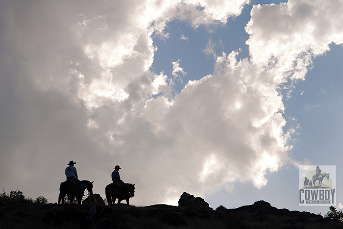 Cowboy Trail Rides - 2 riders in silhouette